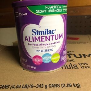 Six cans of Alimentum formula—12.1 cans. Expire 9/22